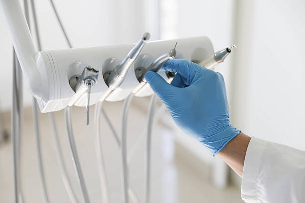 Professional Tooth Extraction technician working in North Sarasota, FL